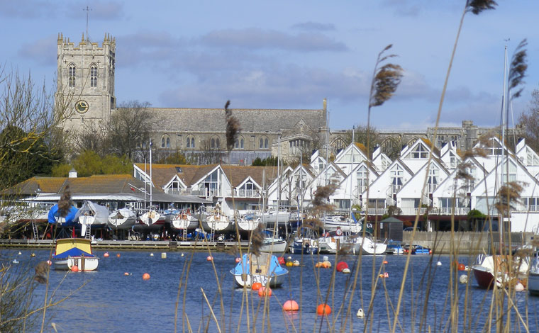 The Priory behind the river